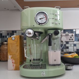 Front view of a green Swan Retro One Touch Espresso Machine