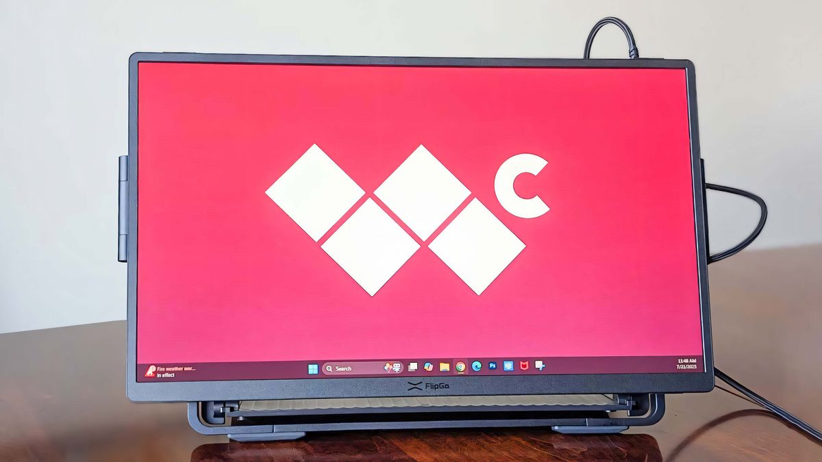The JSAUX FlipGo Horizon stand holding one screen in landscape orientation. The Windows Central logo is on the screen.