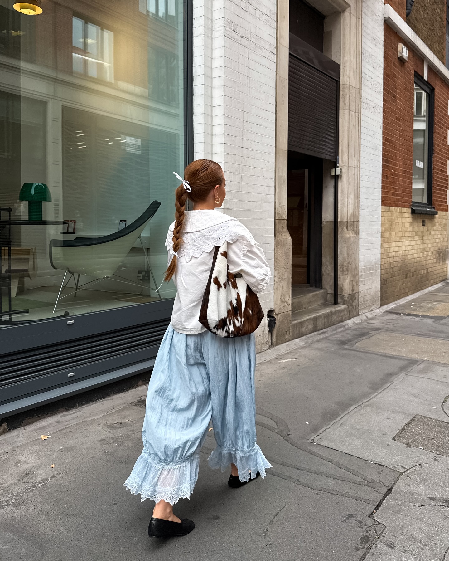 An image of @rebeccaferrazwyatt wearing bloomers, one of the key autumn London fashion trends 2025.