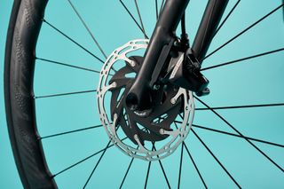 SRAM Force AXS groupset on a blue background