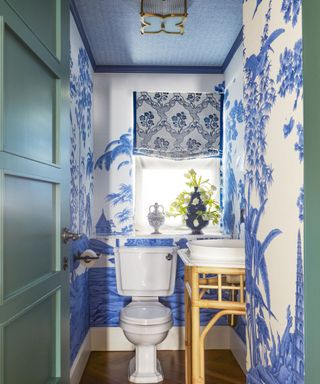 Blue and white landscape wallpaper, bamboo sink stand