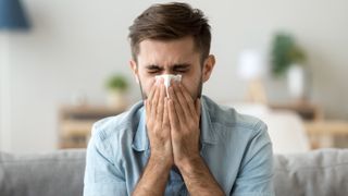 a man sneezing