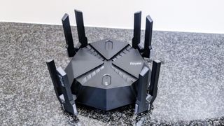 Reyee RG-E6 gaming router on a counter top