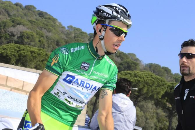 Marco Canola wearing the mountain classification leader's jersey ahead of the stage