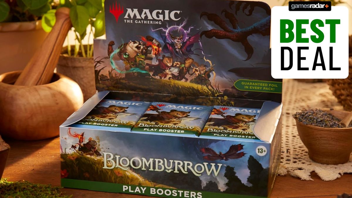 A Play Booster Box for MTG Bloomburrow on a wooden table strewn with natural materials