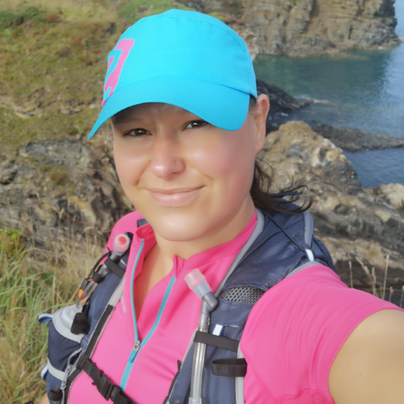 female stood on coastal path