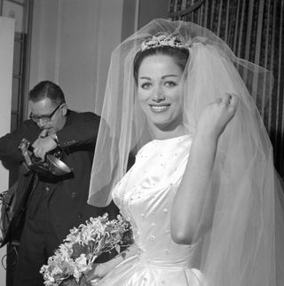 Jackie Collins aged 22 at her London wedding to Wallace Austin