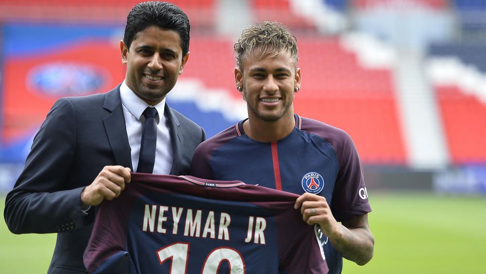 Neymar arrives at PSG from Barcelona in a record-breaking transfer