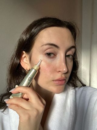 Alyssa Brascia using the Dr. Dennis Gross Skincare DermInfusions Fill + Repair Eye Cream