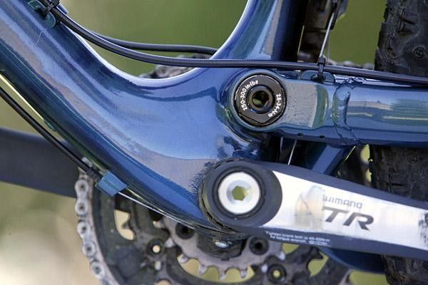 Cartridge bearings support the pivot near the bottom bracket.