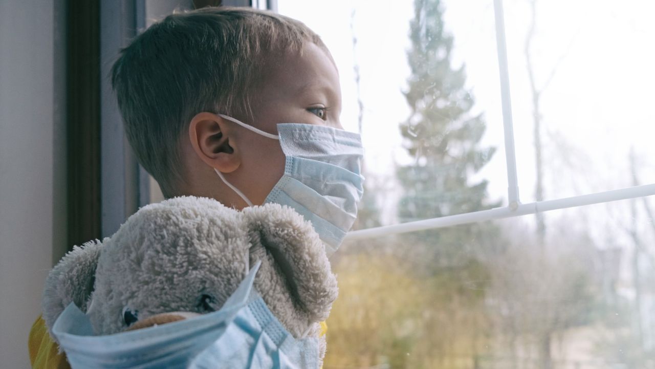 Child in a Covid mask