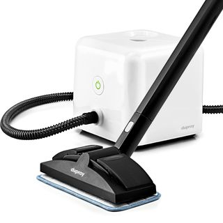 A white steam cleaner with a black hose and black attachment