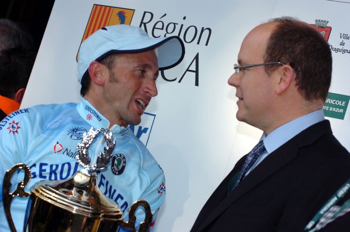 Rebellin with Prince Albert of Monaco after his 2008 Tour du Haut Var victory. He would win Paris-Nice the following month.