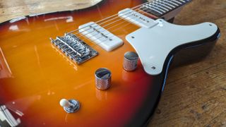 Close up of the knobs on a Squier Paranormal Baritone Cabronita Telecaster