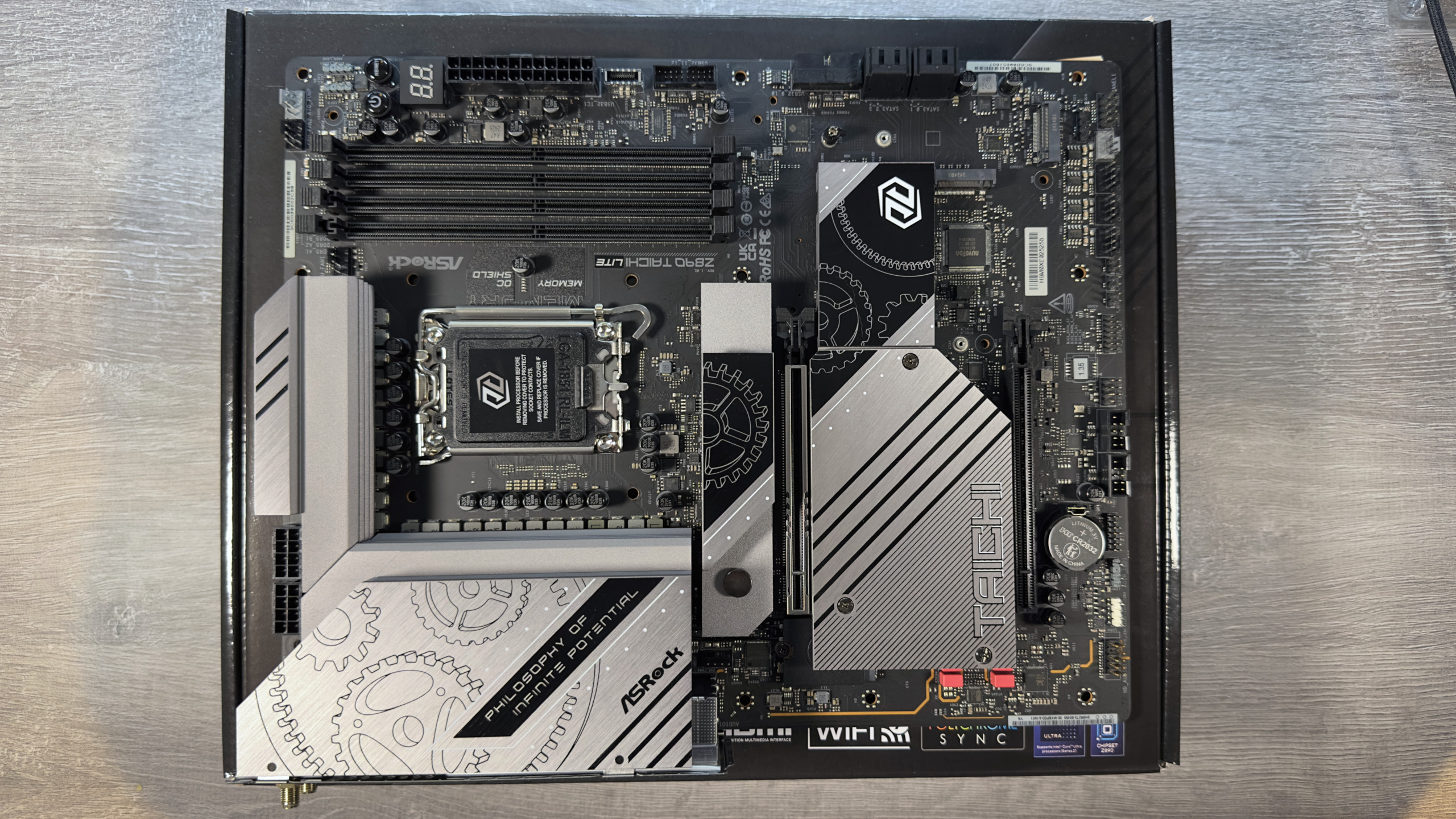 A photo of an ASRock Z890 Taichi Lite motherboard