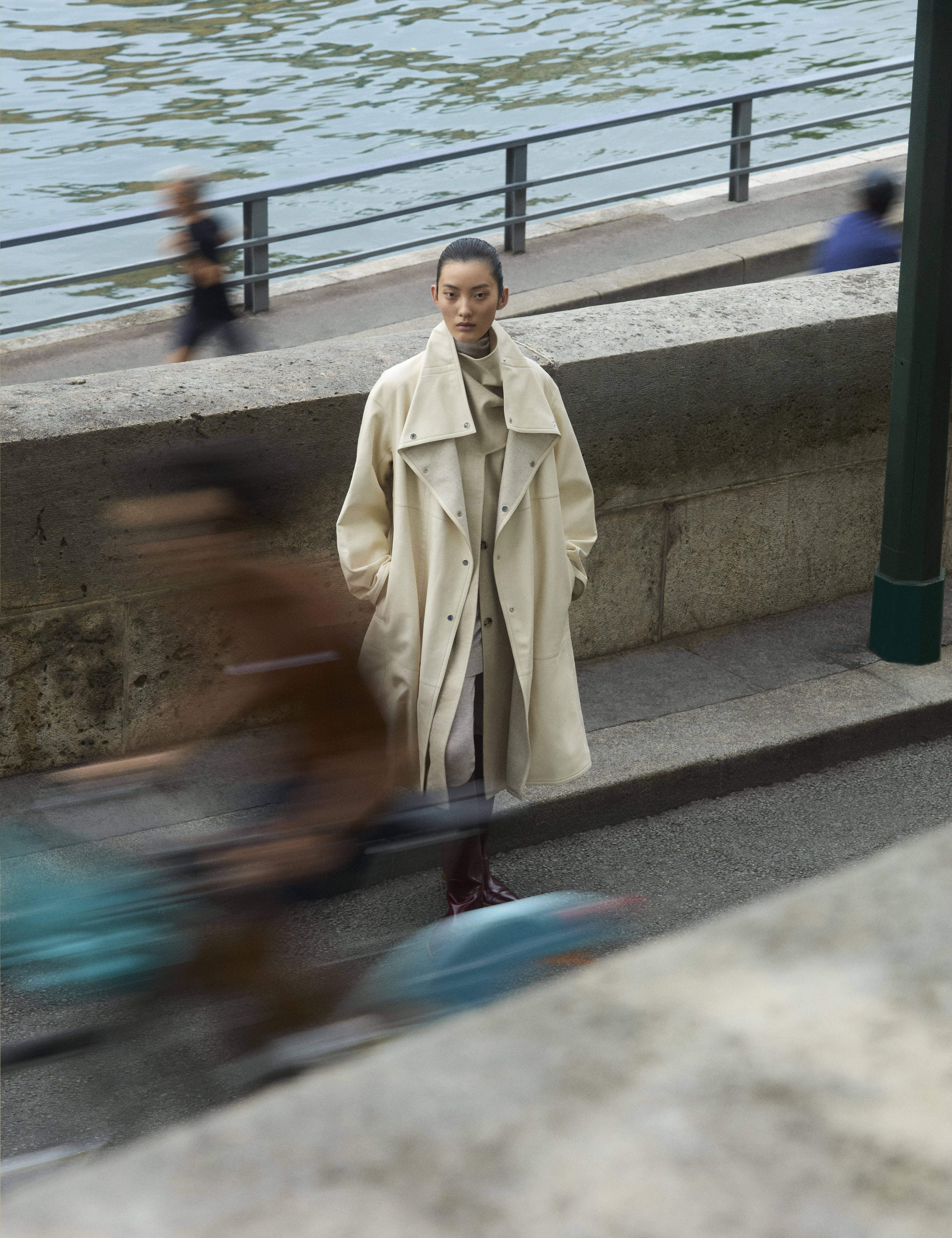 a model on the streets of paris wearing designs from the autumn/winter 2025 collections
