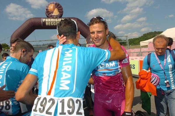 Alessandro Petacchi (Milram) is congratulated by his Milram team.