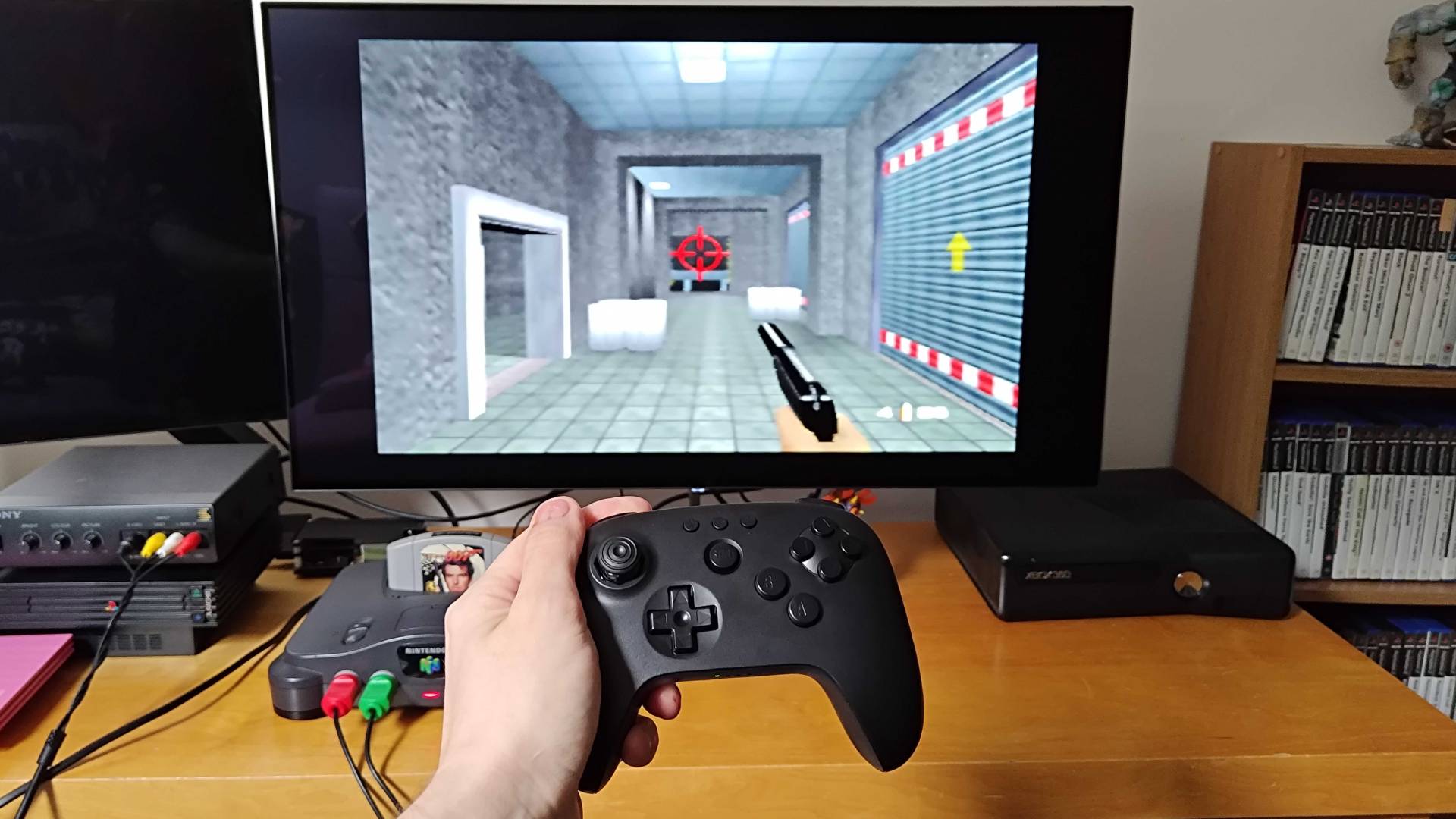 8Bitdo N64 Bluetooth controller being used to play Goldeneye on original Nintendo 64 connected to monitor.