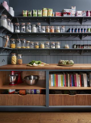 Roundhouse walk in pantry with open shelving