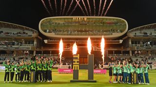 Champions The Southern Braves (l) and the Oval Invincibles (r) parade their trophies in front of the media centre and the Compton (l) and Edrich Stands after The Hundred Final match between Birmingham Phoenix Men and Southern Brave Men at Lord's Cricket Ground on August 21, 2021 in London, England.