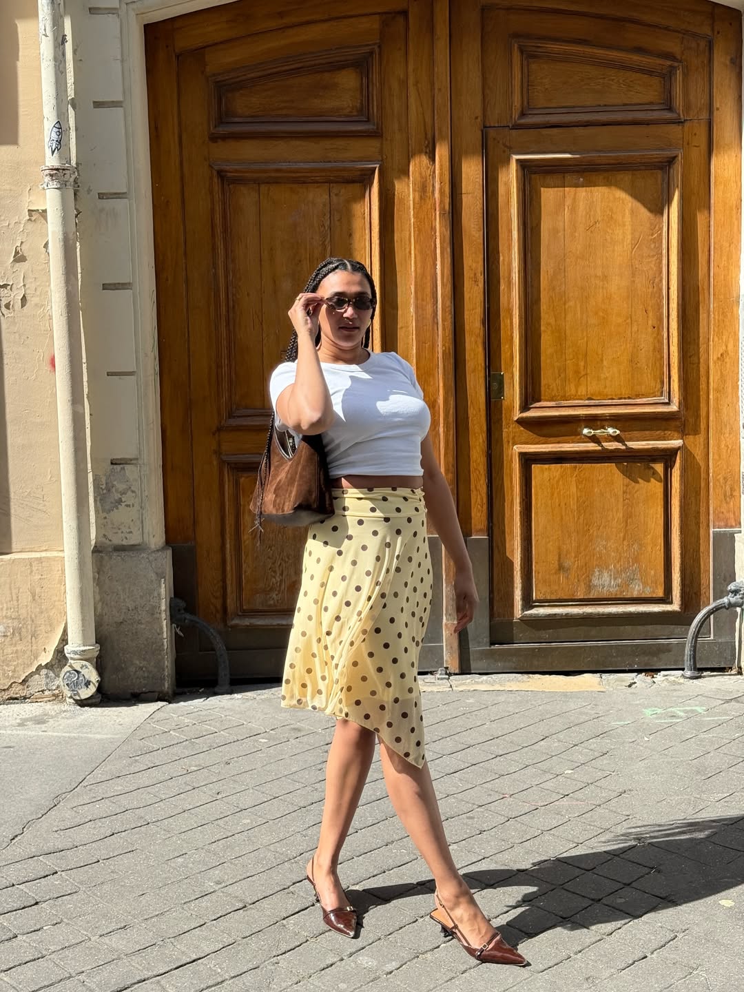 L&amp;eacute;na Farouil in a white tee