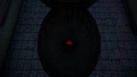 Toilet Spiders screenshot - a giant red-eyed spider in a filthy toilet