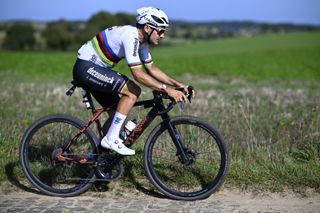Gianni Vermeersch riding a gravel bike
