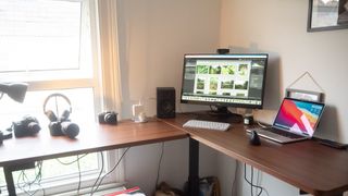 The Brödan Electric Standing L Desk, one of the best standing desks, in a home office