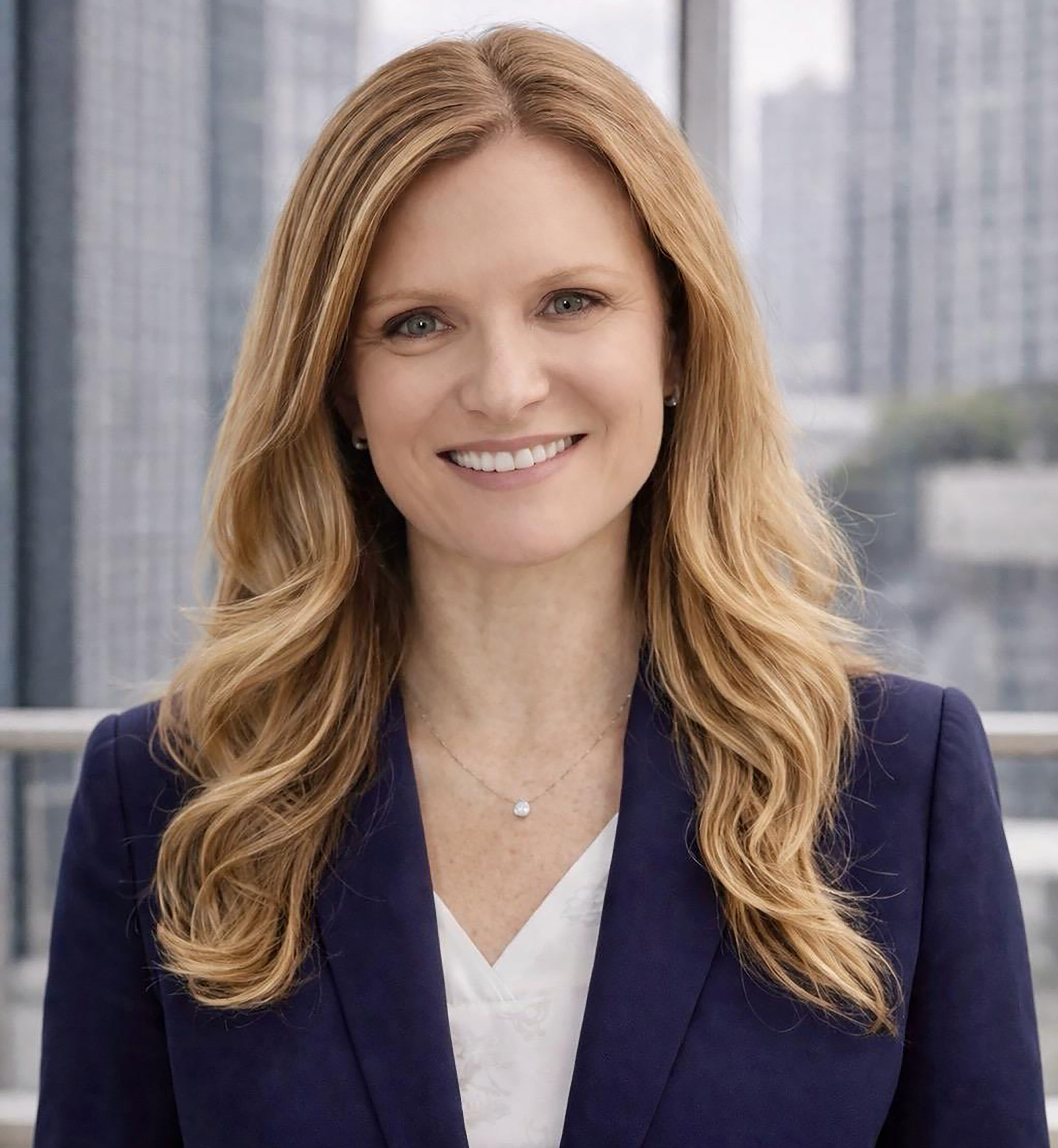 Smiling headshot of Anna Kozel.