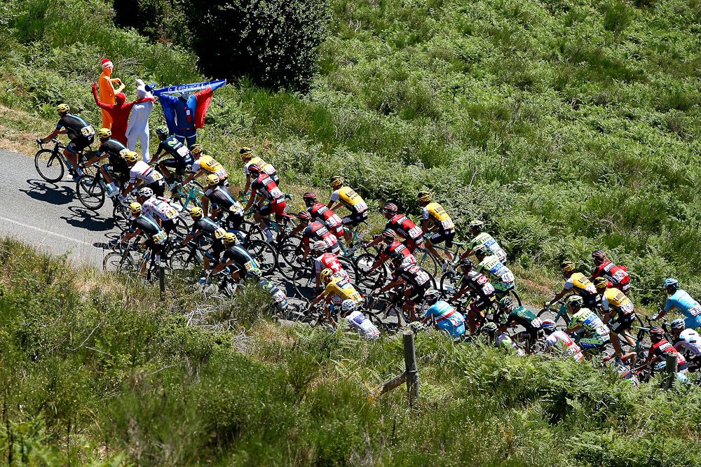 The peloton cruises through the French countryside during stage 11.