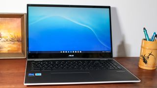 Asus Chromebook Flip CX5 (2022) open on a desk showing windows desktop