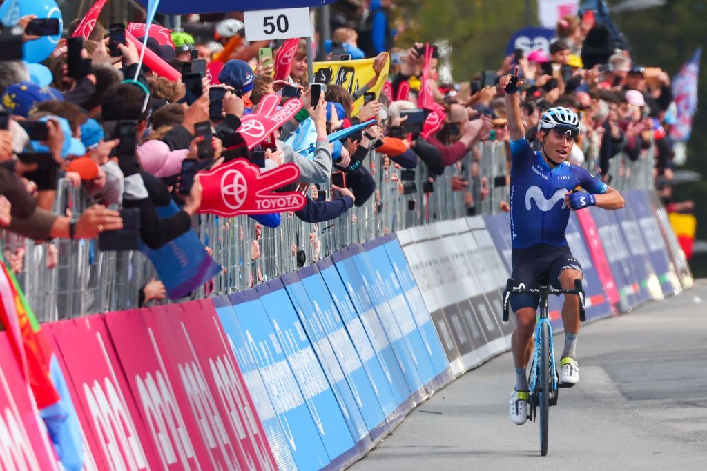 TOPSHOT Movistar Teams Colombian rider Einer Rubio celebrates as he arrives to cross the finish line to win the thirteenth stage of the Giro dItalia 2023 cycling race which start was transfered from Borgofranco dIvrea to Le Chable in Switzerland due to bad weather conditions and CransMontana on May 19 2023 Photo by Luca Bettini AFP Photo by LUCA BETTINIAFP via Getty Images