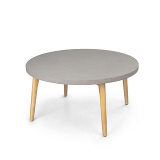 A concrete top coffee table