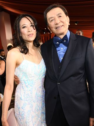 US actor James Hong and April Hong attend the 95th Annual Academy Awards at the Dolby Theatre in Hollywood, California on March 12, 2023