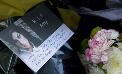 A memorial to Amy Winehouse outside her London home: While many suspected it was drugs and alcohol that caused the singer's demise, her family says it was the lack there of.