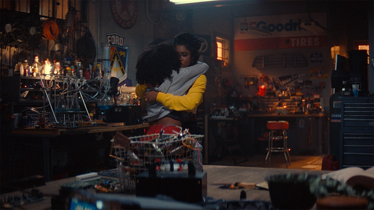 Riri and the reborn Natalie hugging in the former's workshop in Ironheart episode 6