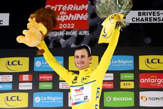 BRIVESCHARENSAC FRANCE JUNE 06 Alexis Vuillermoz of France and Team Total Energies celebrates winning the Yellow Leader Jersey on the podium ceremony after the 74th Criterium du Dauphine 2022 Stage 2 a 1698km stage from SaintPray to BrivesCharensac WorldTour Dauphin on June 06 2022 in BrivesCharensac France Photo by Dario BelingheriGetty Images