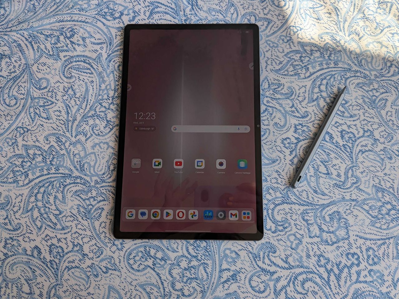 A Lenovo Idea Tab Pro tablet on a blue and white table