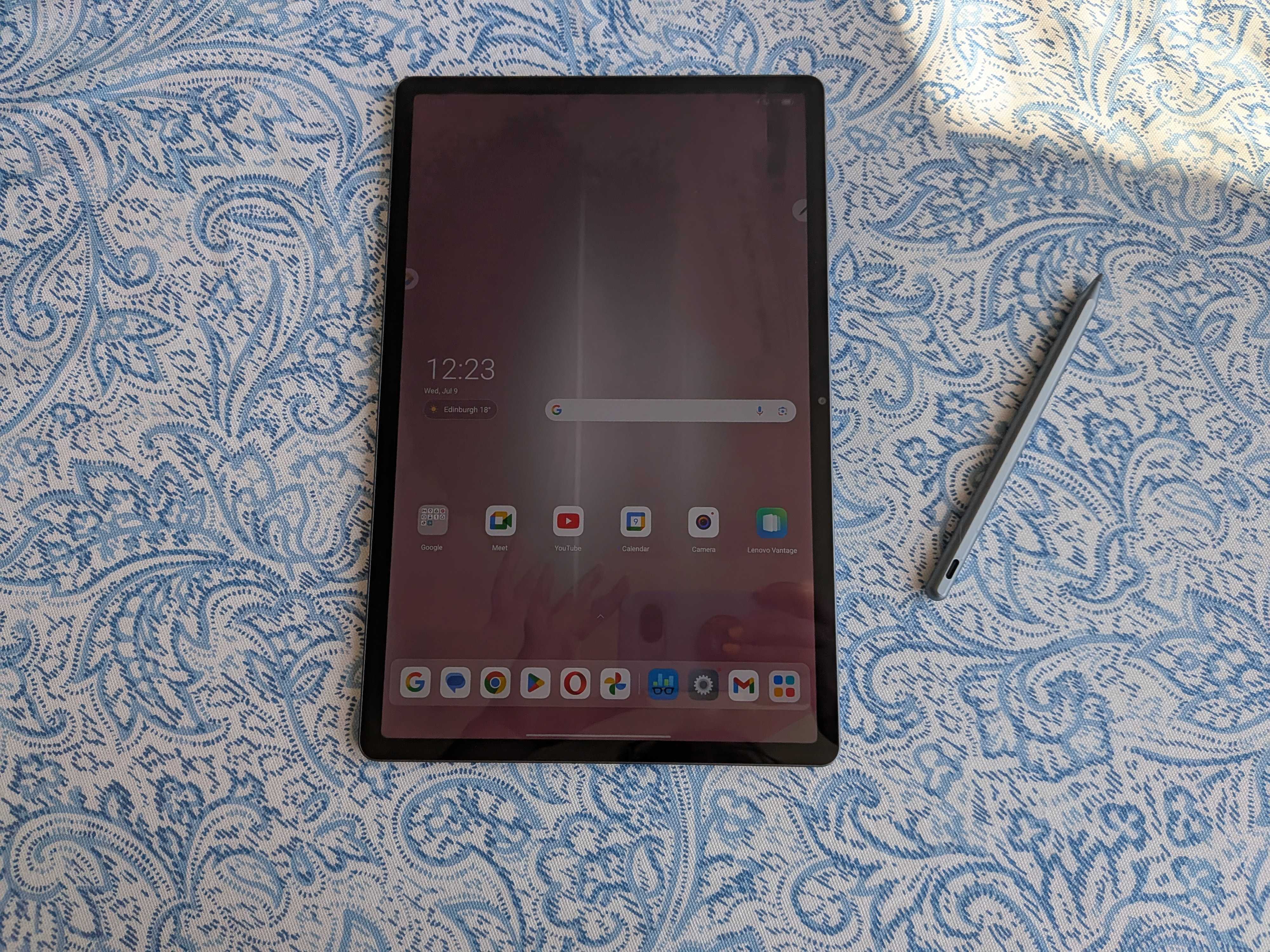 A Lenovo Idea Tab Pro tablet on a blue and white table