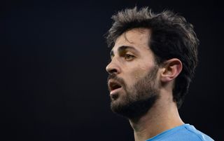 Side-on head shot of Manchester City midfielder Bernardo Silva