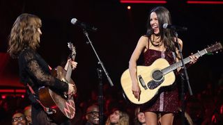 LOS ANGELES, CALIFORNIA - NOVEMBER 08: Feist and Olivia Rodrigo perform onstage during the 2025 Rock & Roll Hall Of Fame Induction Ceremony - Inside at Peacock Theater on November 08, 2025 in Los Angeles, California. (Photo by Theo Wargo/Getty Images for RRHOF)