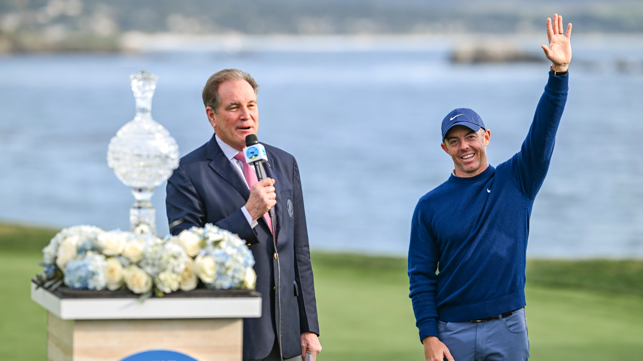 Rory McIlroy is presented with the AT&amp;amp;T Pebble Beach Pro-Am trophy