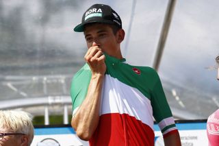 Davide Formolo celebrates winning the men's road race at the 2019 Italian Championships