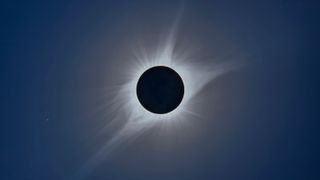 A composite of the August 21, 2017 total solar eclipse. The bright star at left is Regulus.