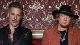 Adrian Smith and Richie Kotzen posing for a photograph