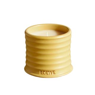 A yellow candle holder