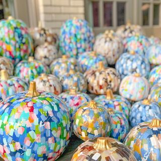 painted pumpkins in multiple colours