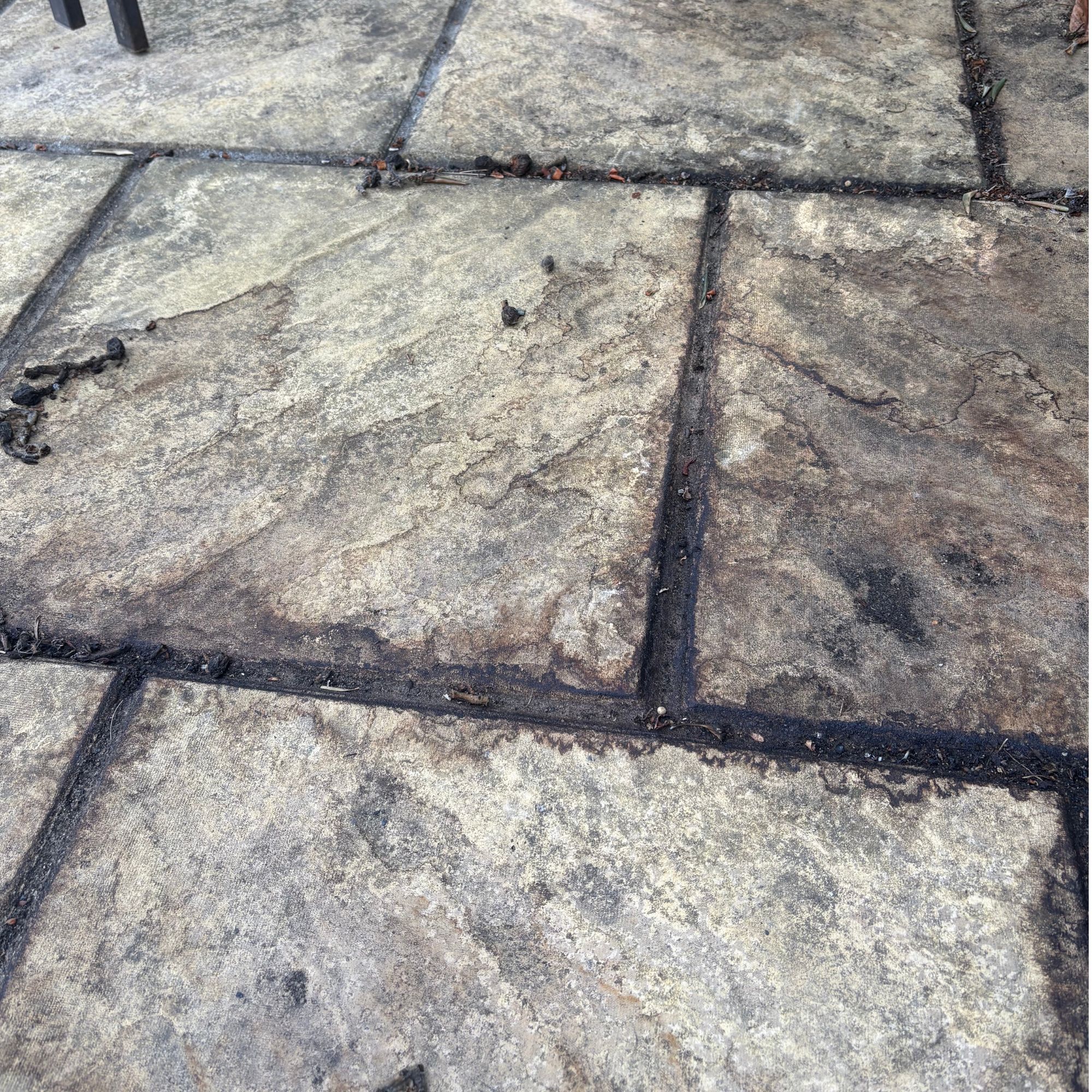 Compost stains on a garden patio