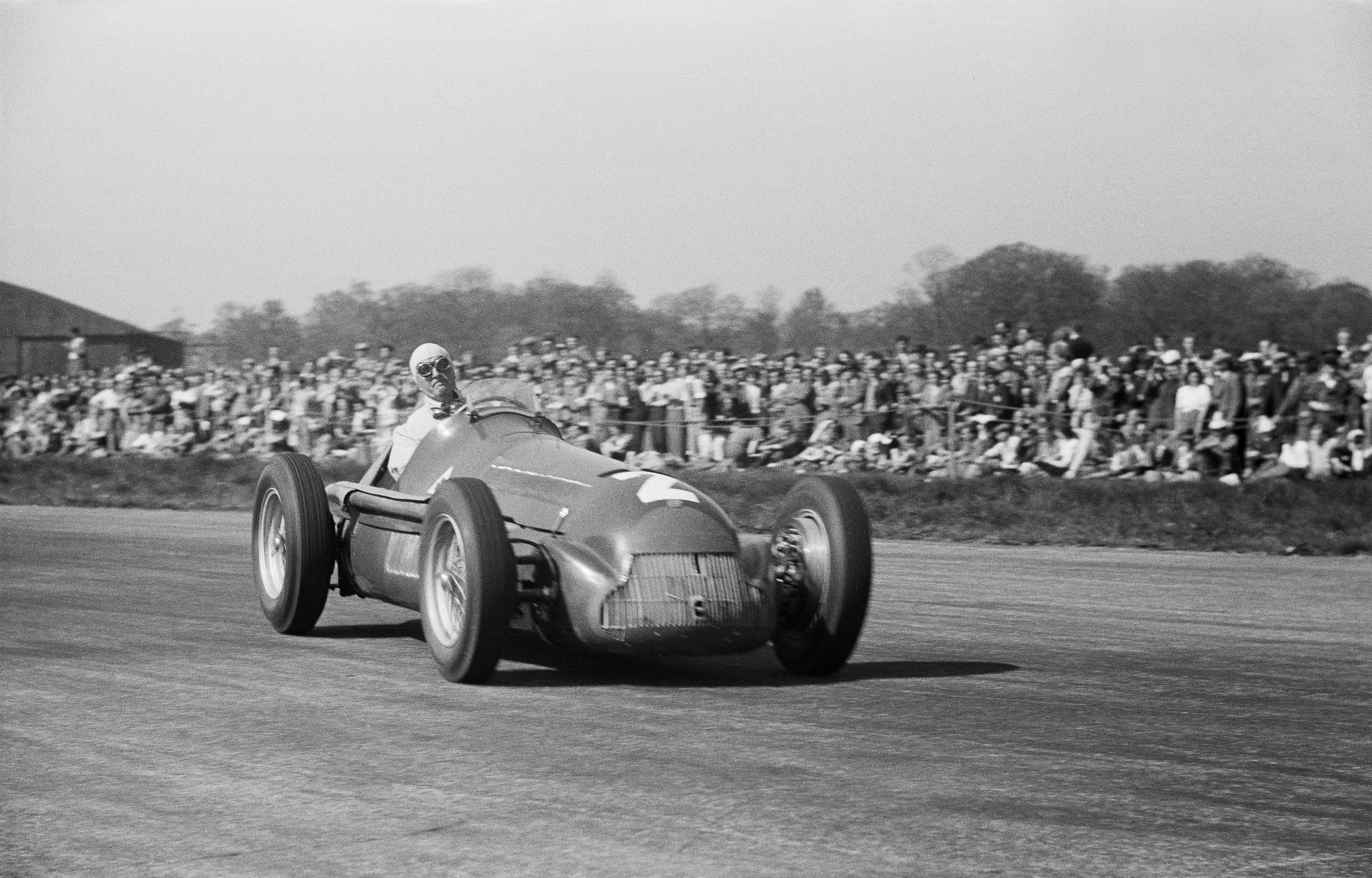 Giuseppe Farina driving round Silverstone