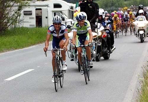 Alberto Contador (W&uuml;rth) attacks the bunch, with early breakaway rider Kjell Carlstr&ouml;m (Liquigas) hanging on.